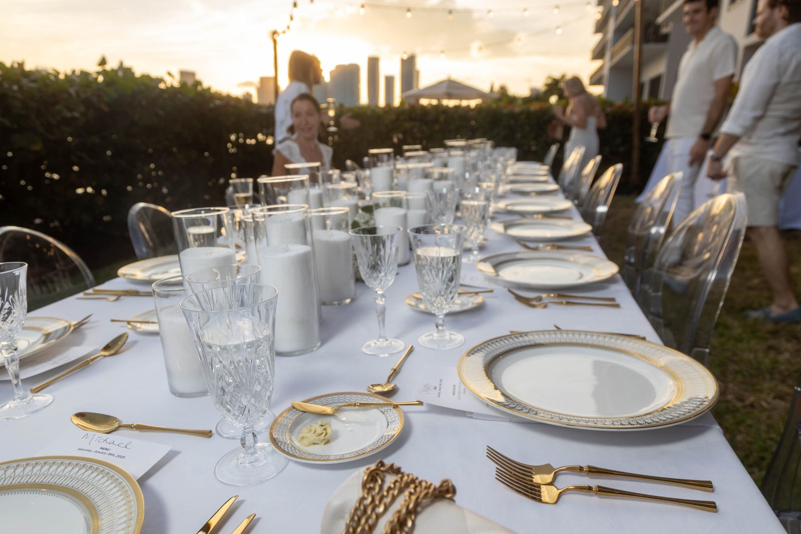 Elegant table setting at an outdoor evening event in Miami