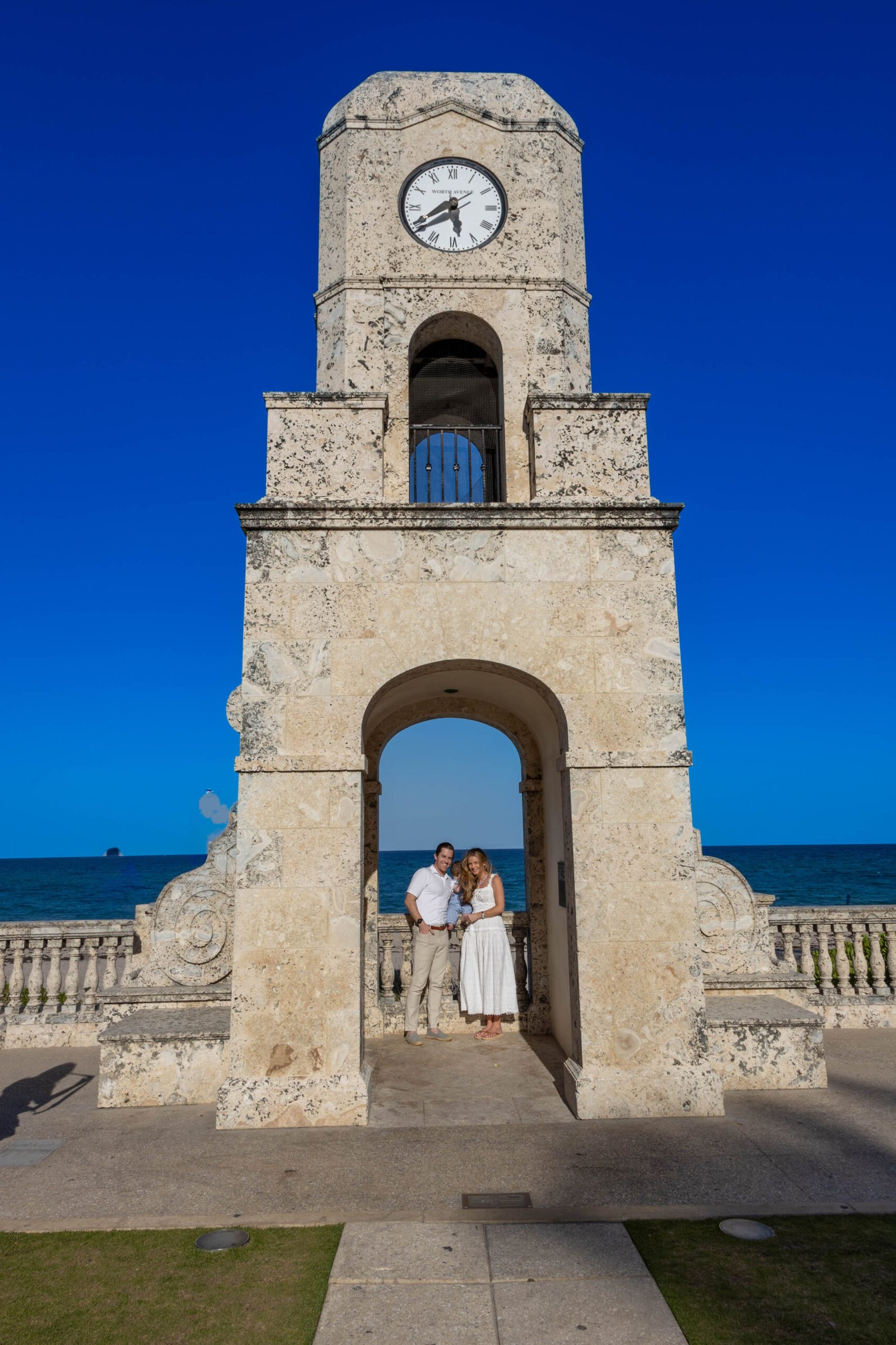 Couple beneath the Worth Avenue clock tower in Palm Beach
