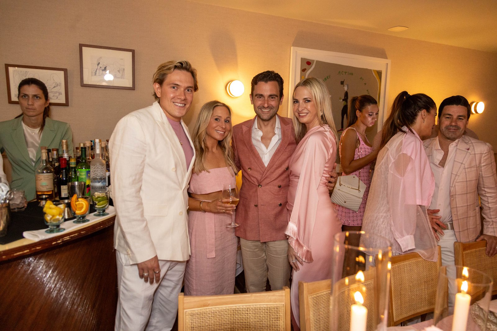 Guests mingling at an elegant indoor reception in Palm Beach