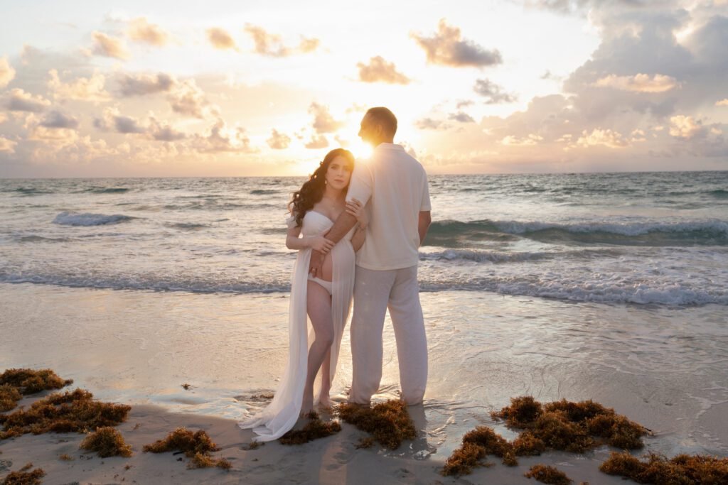 Maternity session capturing expecting parents in natural light