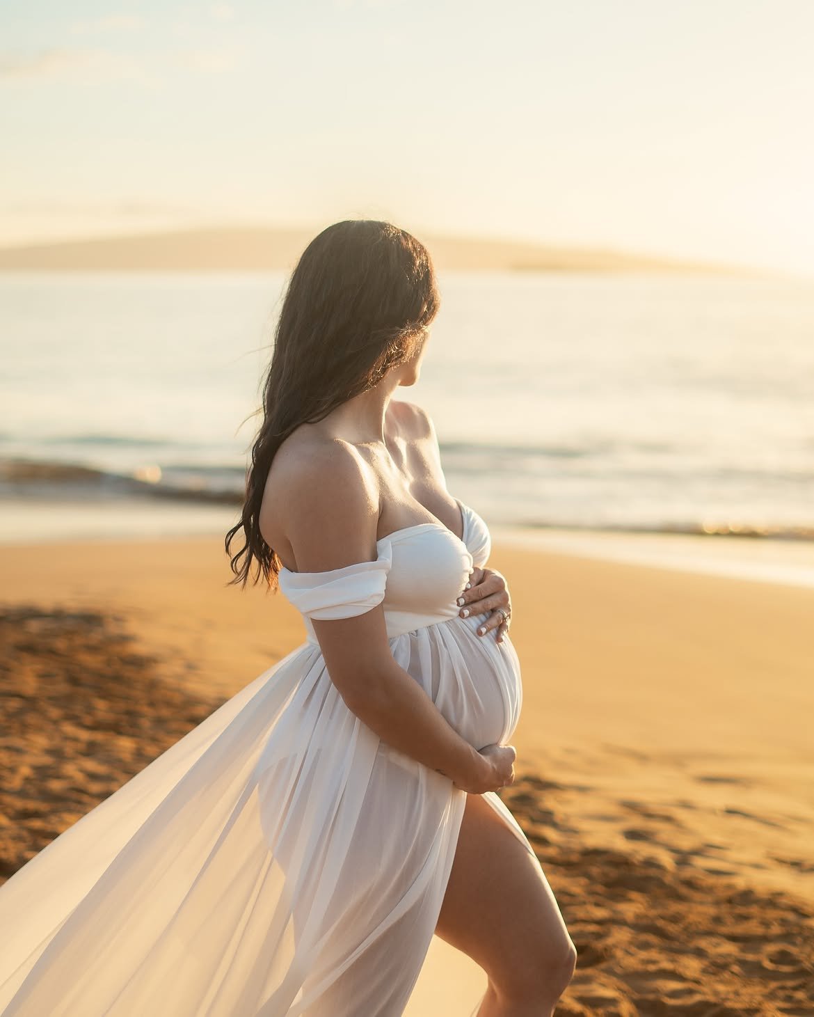 Beach maternity portrait in warm evening light in South Florida