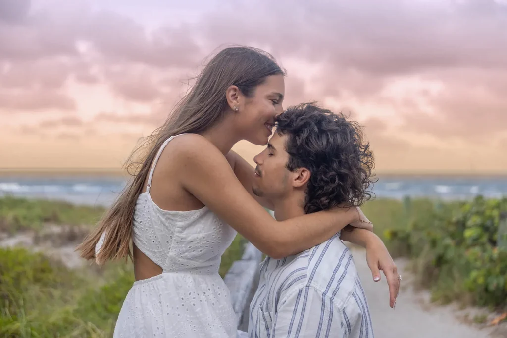 Romantic couple embracing ocean view West Palm Beach engagement photographer LGBTQ inclusive love