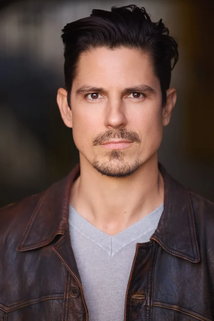 Professional headshot of a man in a brown leather jacket, actor headshots in West Palm Beach