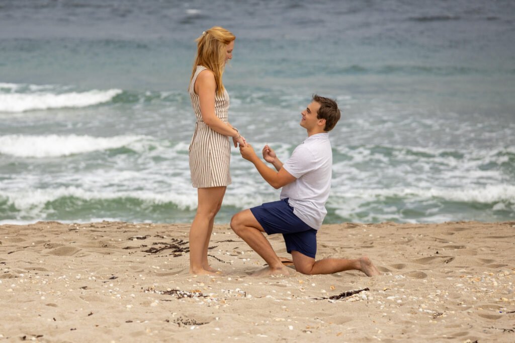Man proposing to his girlfriend on the beach in Singer Island, Palm Beach County